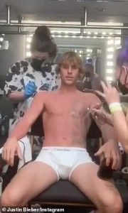 Justin Bieber Displays Tattoo Removal Method In A Pair Of White Shorts